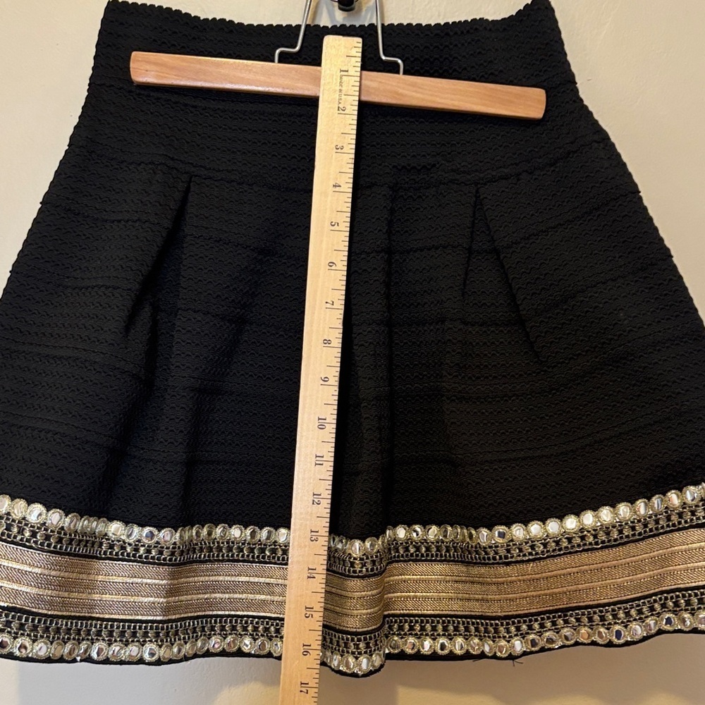 Chic Black Skater Skirt with Gold Accents